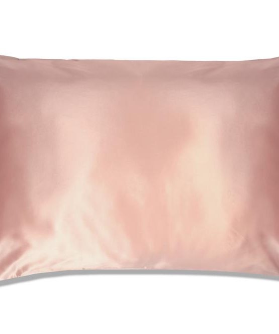Pink Colored Silk Pillowcase Displayed On A White Background