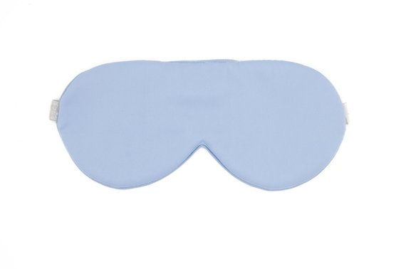 Blue Colored Silk Sleep Mask Displayed On A White Background