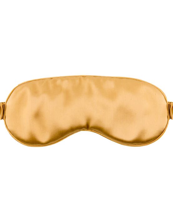 Gold Colored Silk Sleep Mask Displayed On A White Background